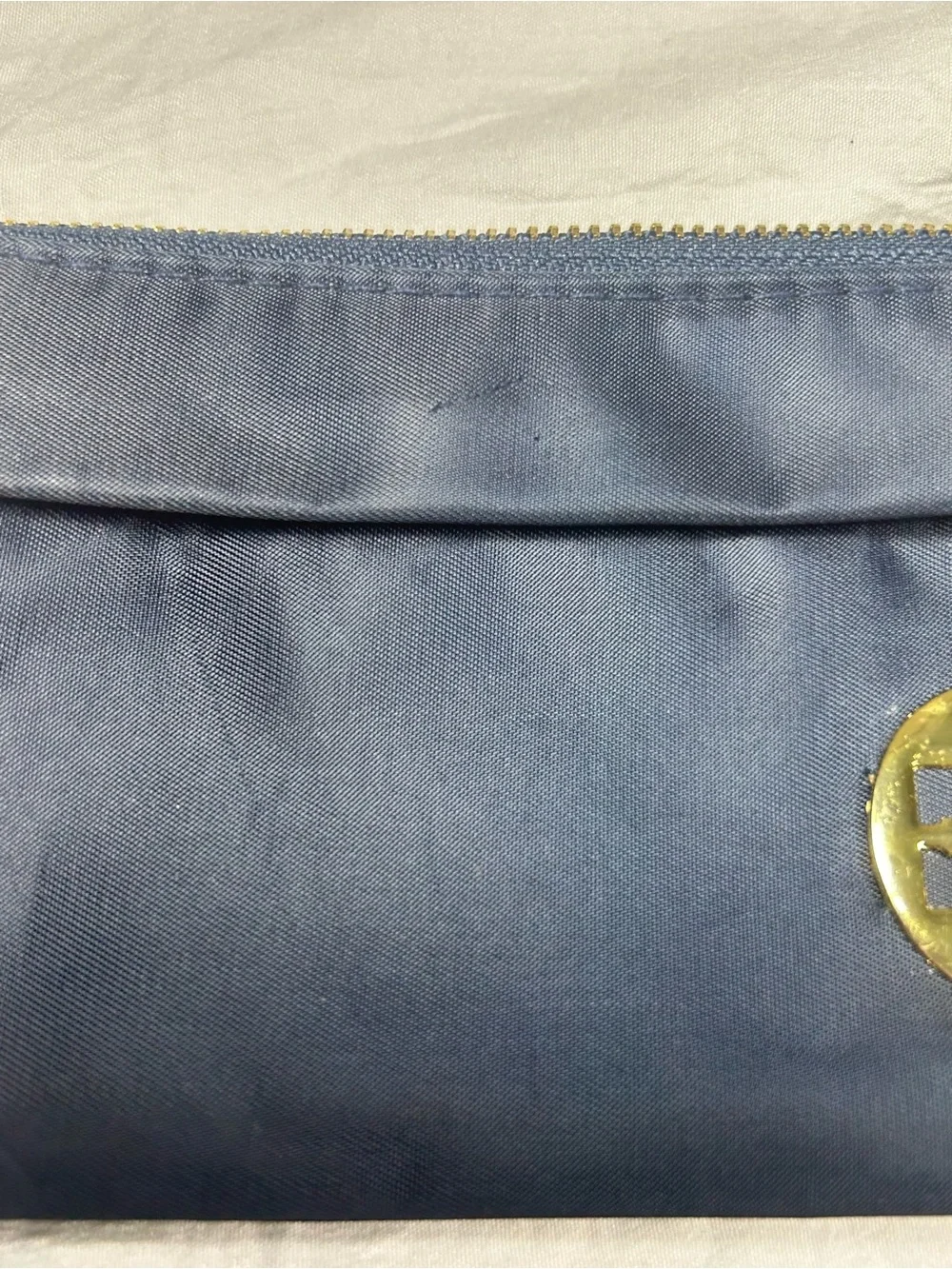 Tory Burch Navy Wristlet with Gold Emblem
